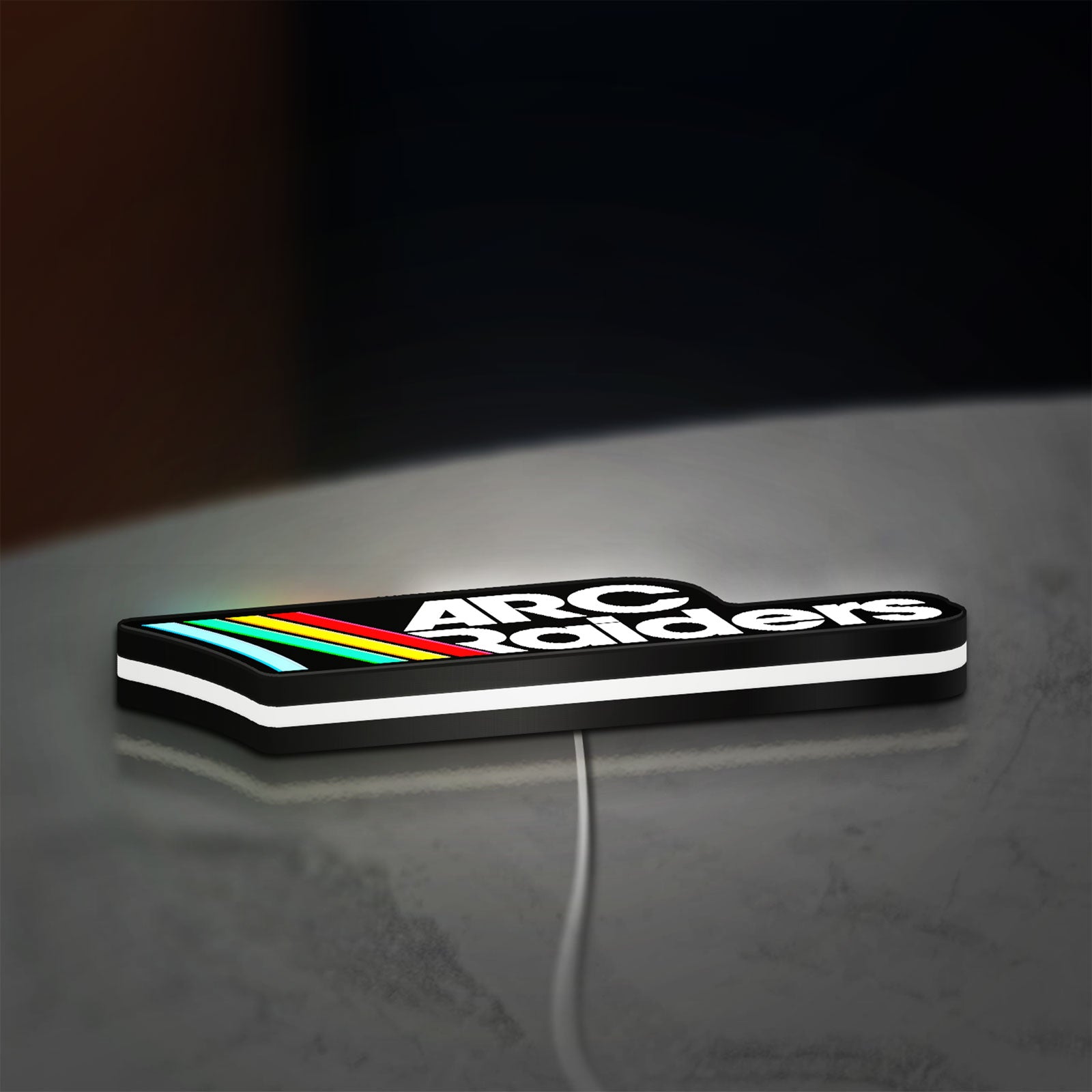 ARC Raiders Sci-Fi Looter Shooter LED lightbox lying flat on a desk with white glow