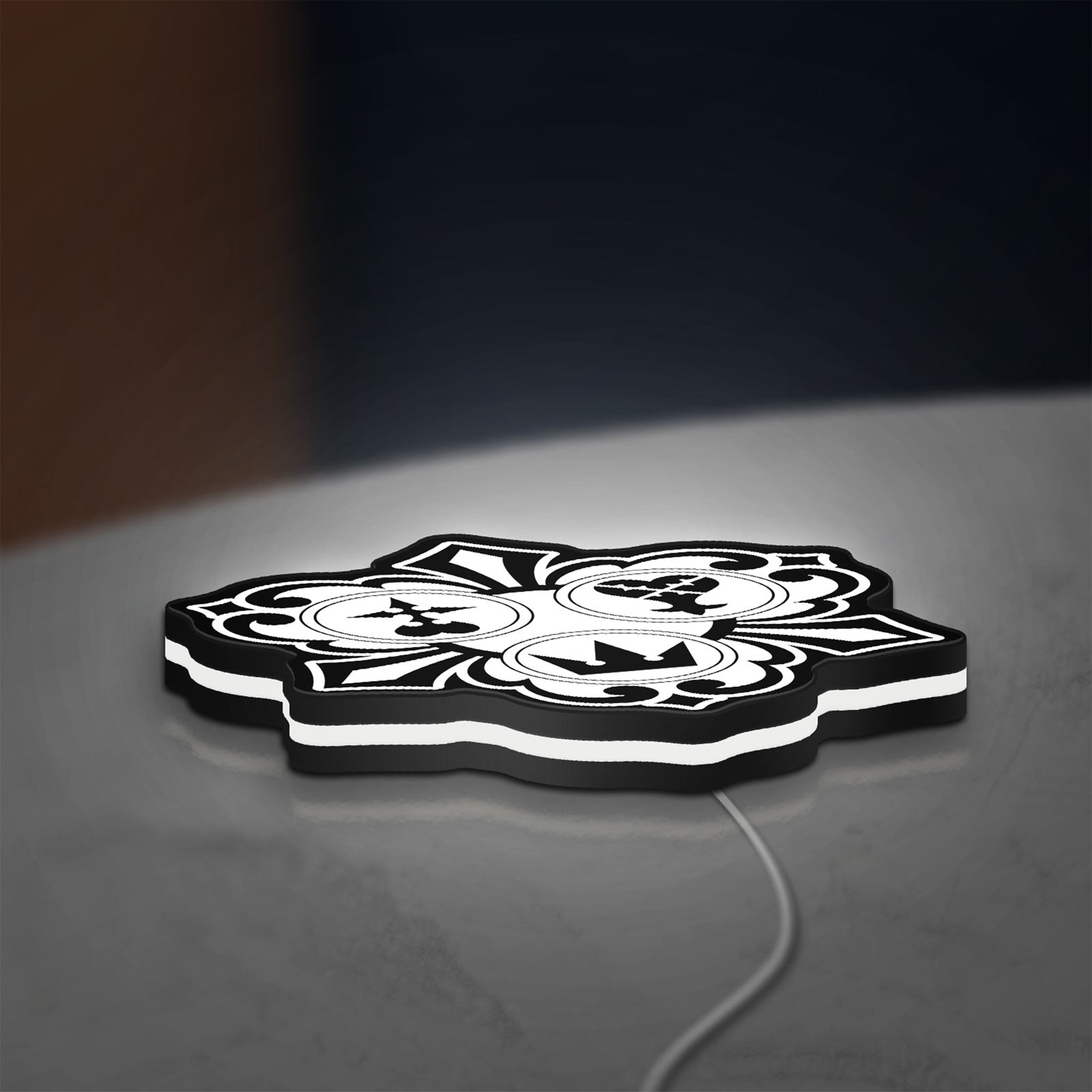 Kingdom Hearts Keyblade Sora Crown LED lightbox lying flat on a desk with white glow