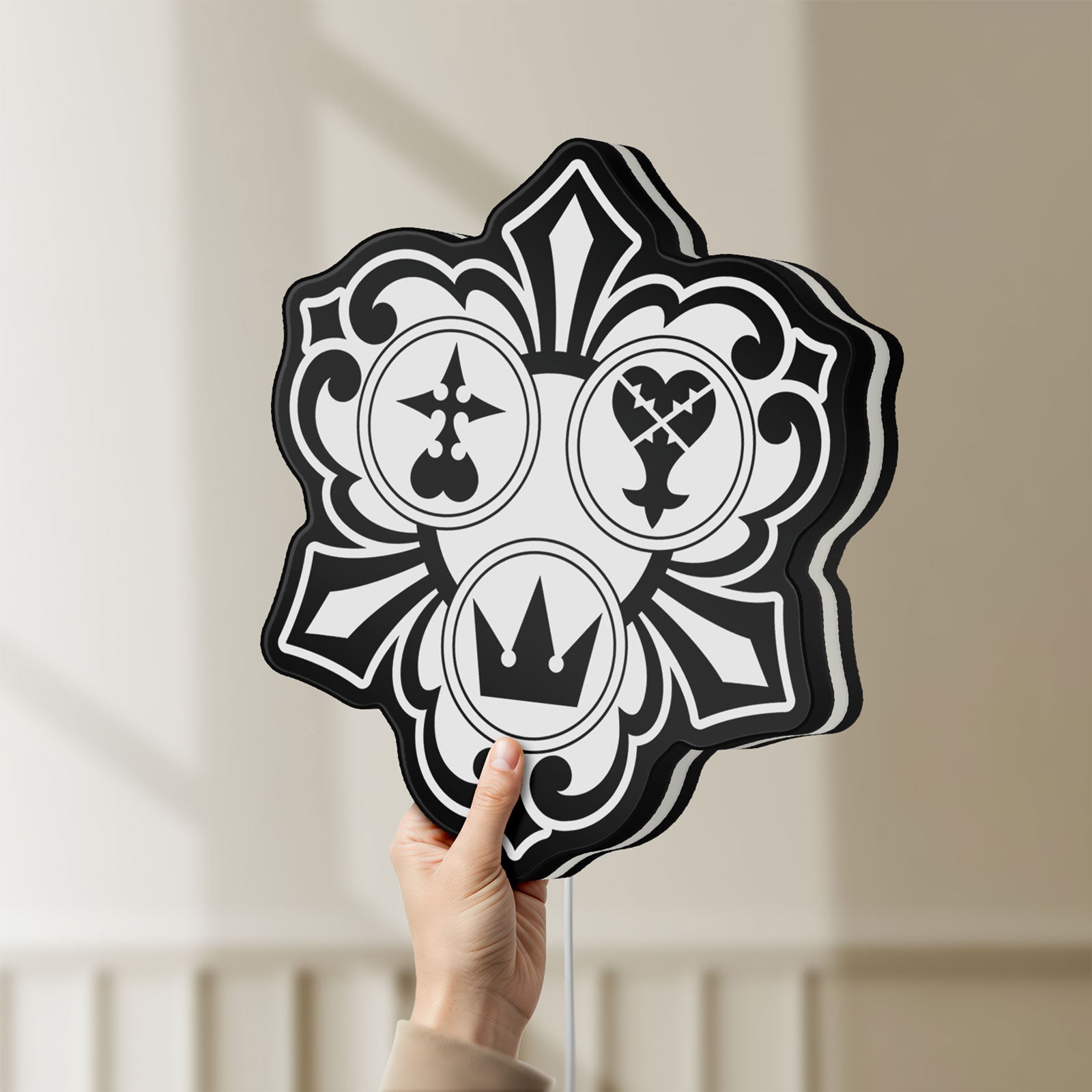 Unlit Kingdom Hearts Keyblade Sora Crown LED lightbox held by hand to show size and details