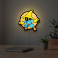 Final Fantasy Black Mage Retro RPG LED lightbox hanging on a room wall with soft yellow light