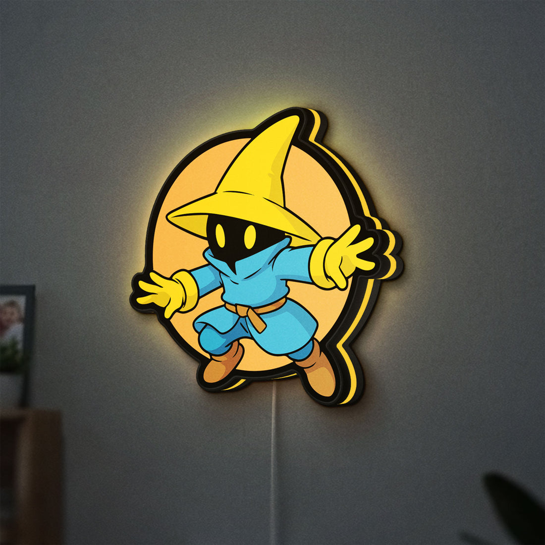 Final Fantasy Black Mage Retro RPG LED lightbox hanging on a wall with yellow glow