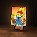 Front view of Final Fantasy Black Mage Retro RPG LED lightbox sign glowing on a wooden desk