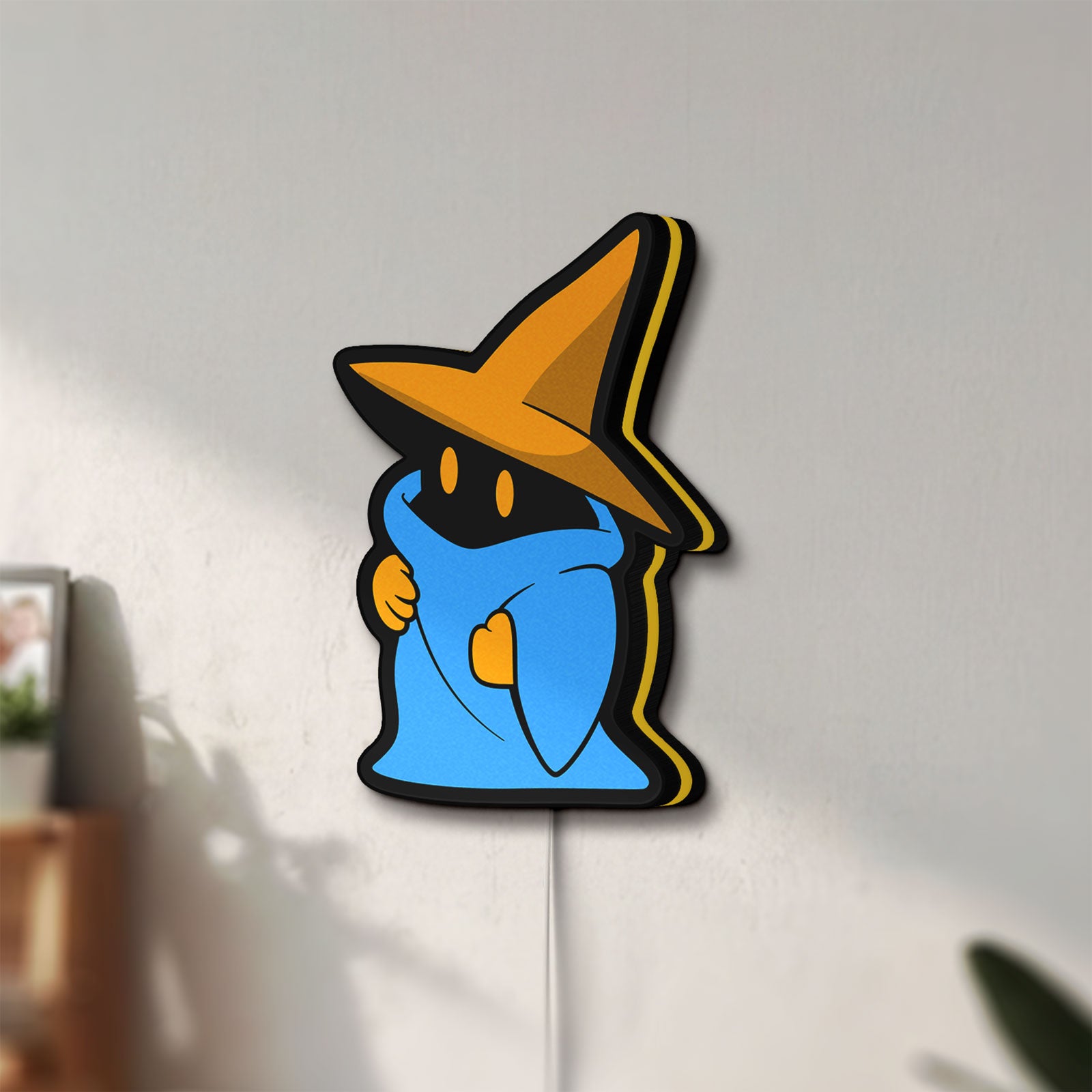 Unlit Final Fantasy Black Mage Retro RPG LED lightbox mounted on a wall in daylight