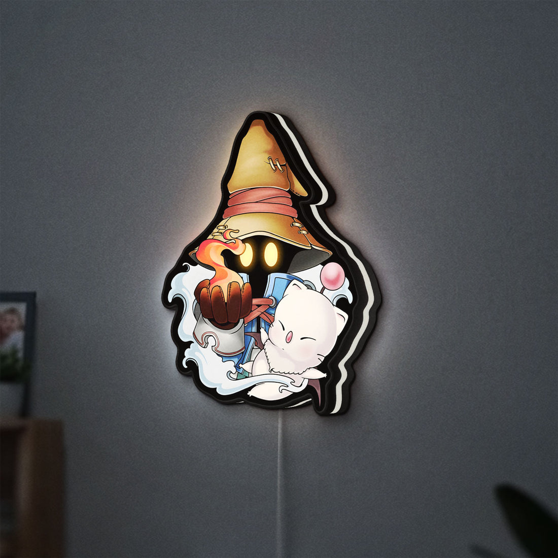 Final Fantasy IX Vivi Ornitier LED lightbox hanging on a wall with white glow