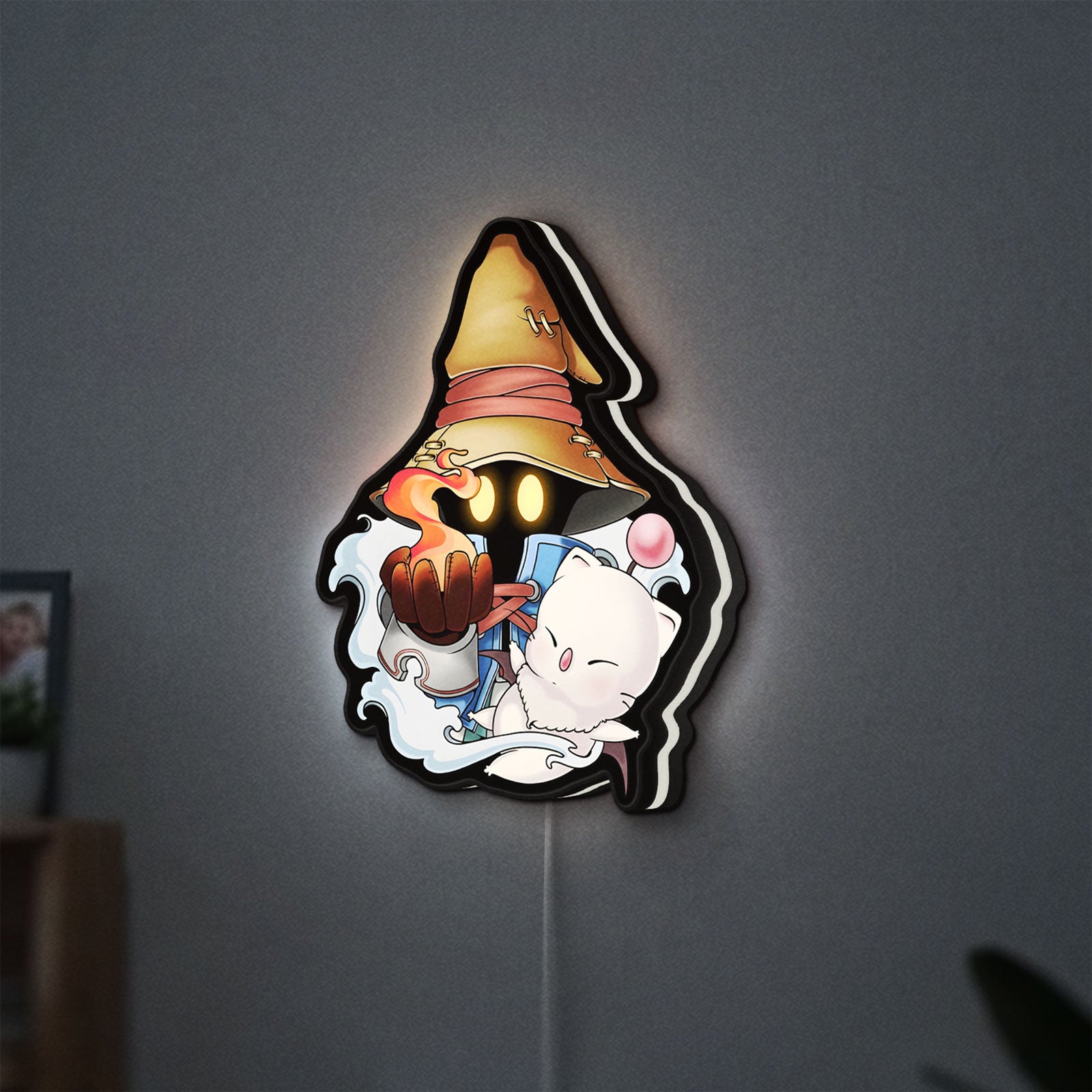 Final Fantasy IX Vivi Ornitier LED lightbox hanging on a wall with white glow
