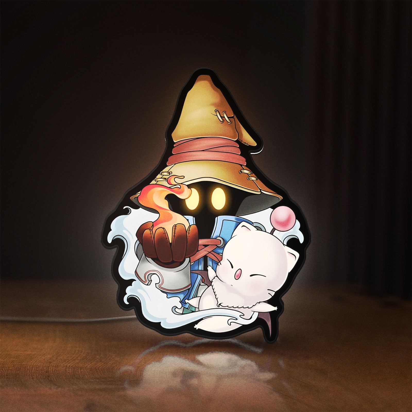 Front view of Final Fantasy IX Vivi Ornitier LED lightbox sign glowing on a wooden desk