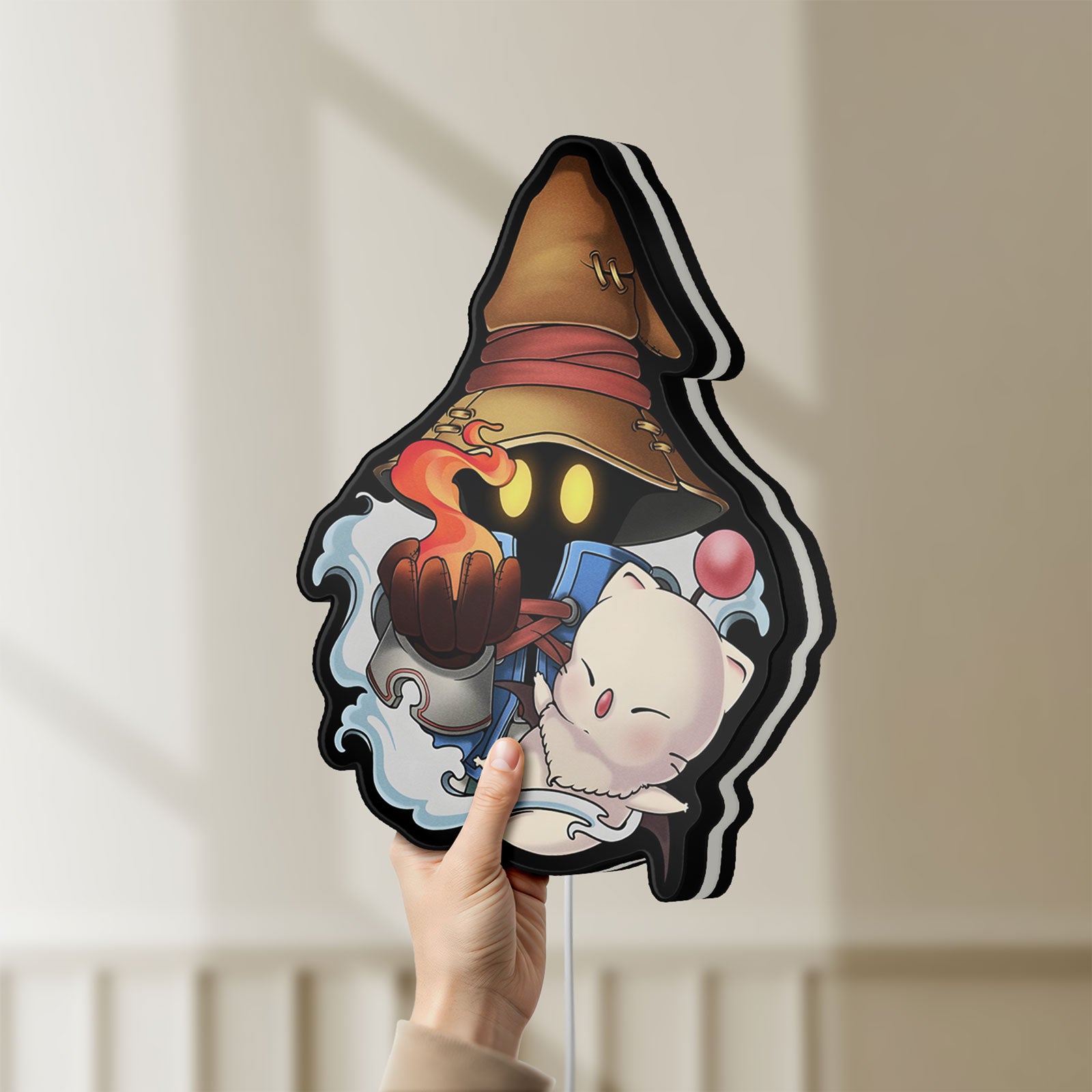 Unlit Final Fantasy IX Vivi Ornitier LED lightbox held by hand to show size and details