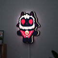 Cult of the Lamb Indie Game LED lightbox hanging on a wall with white glow