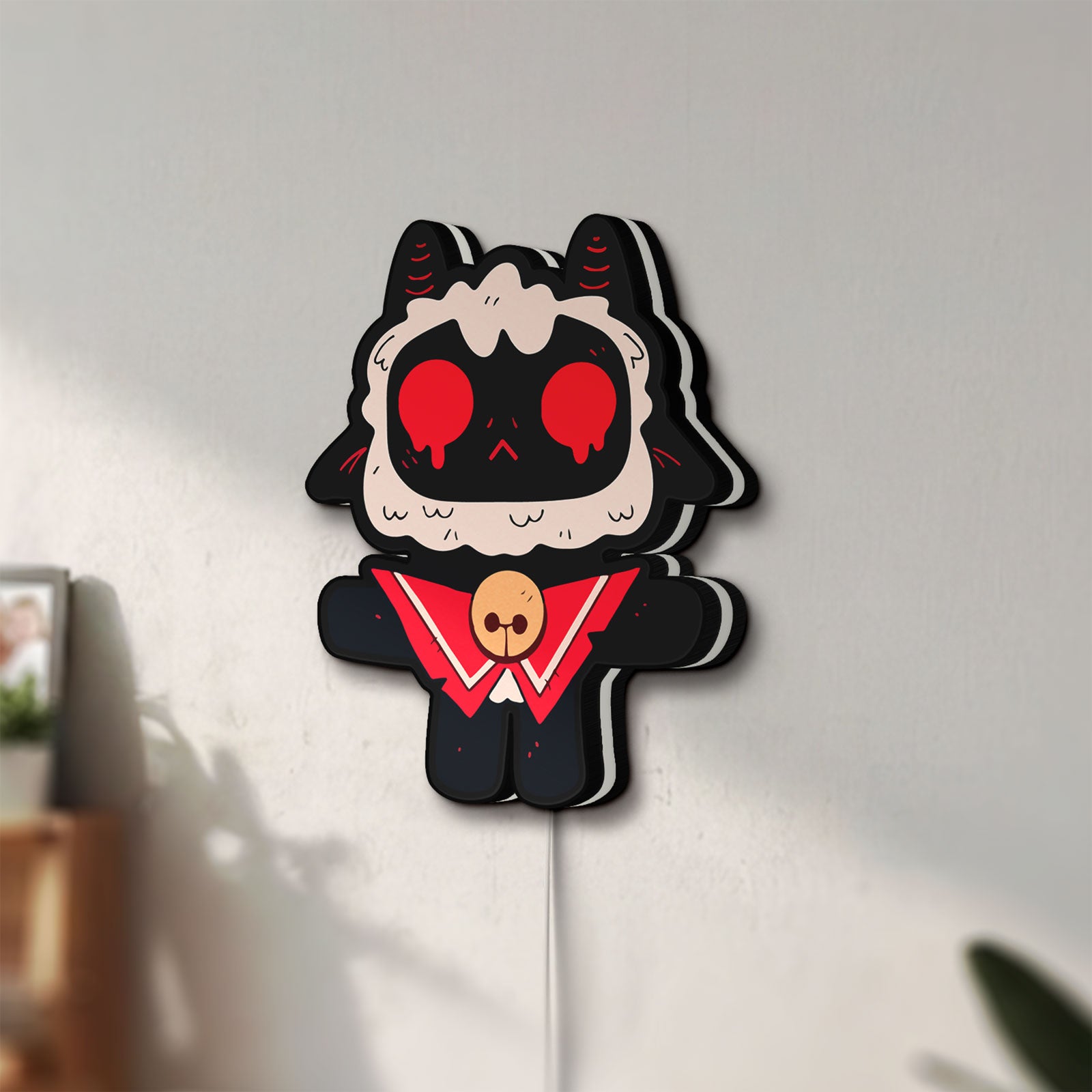 Unlit Cult of the Lamb Indie Game LED lightbox mounted on a wall in daylight