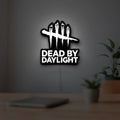 Dead by Daylight DbD Horror LED lightbox hanging on a room wall with soft white light