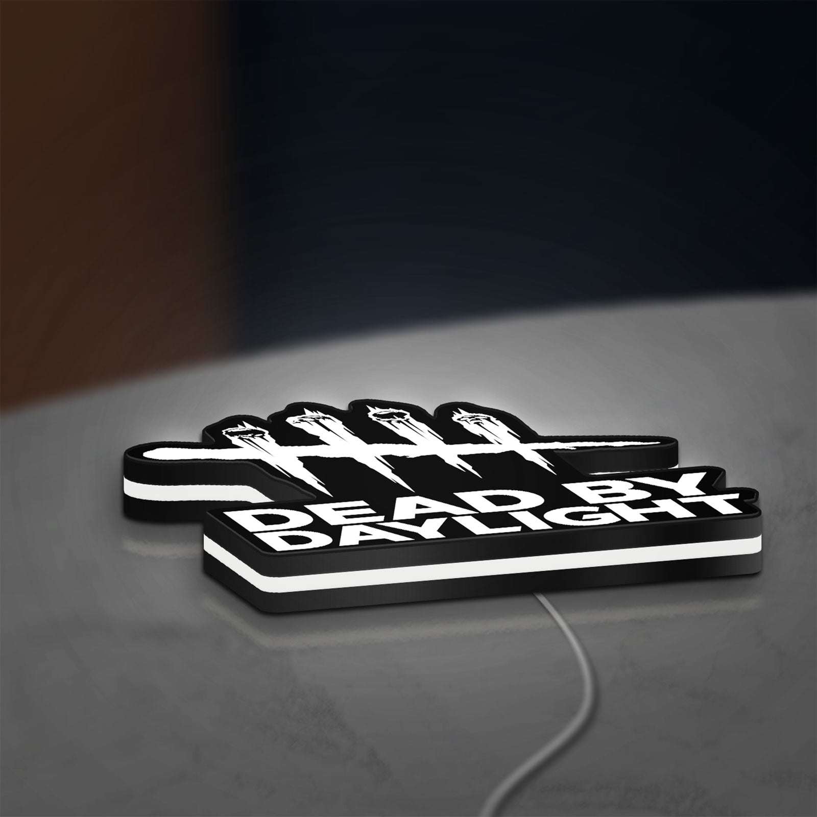 Dead by Daylight DbD Horror LED lightbox lying flat on a desk with white glow