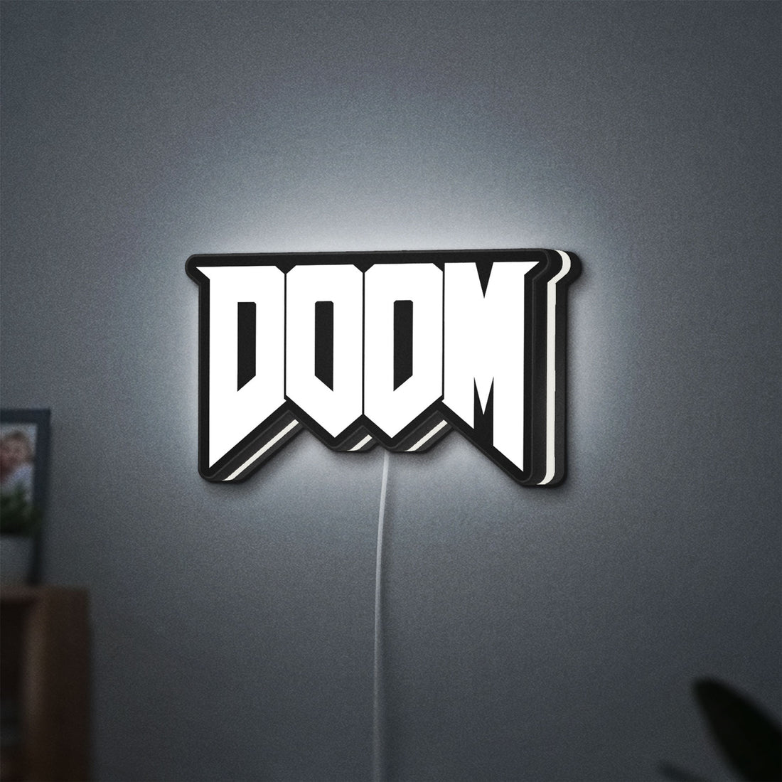 DOOM Slayer Space Marine Retro FPS LED lightbox hanging on a wall with white glow