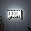 DOOM Slayer Space Marine Retro FPS LED lightbox hanging on a wall with white glow