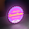Fallout Nuka Cola Quantum RPG LED lightbox standing on a desk from an angled side view with purple glow