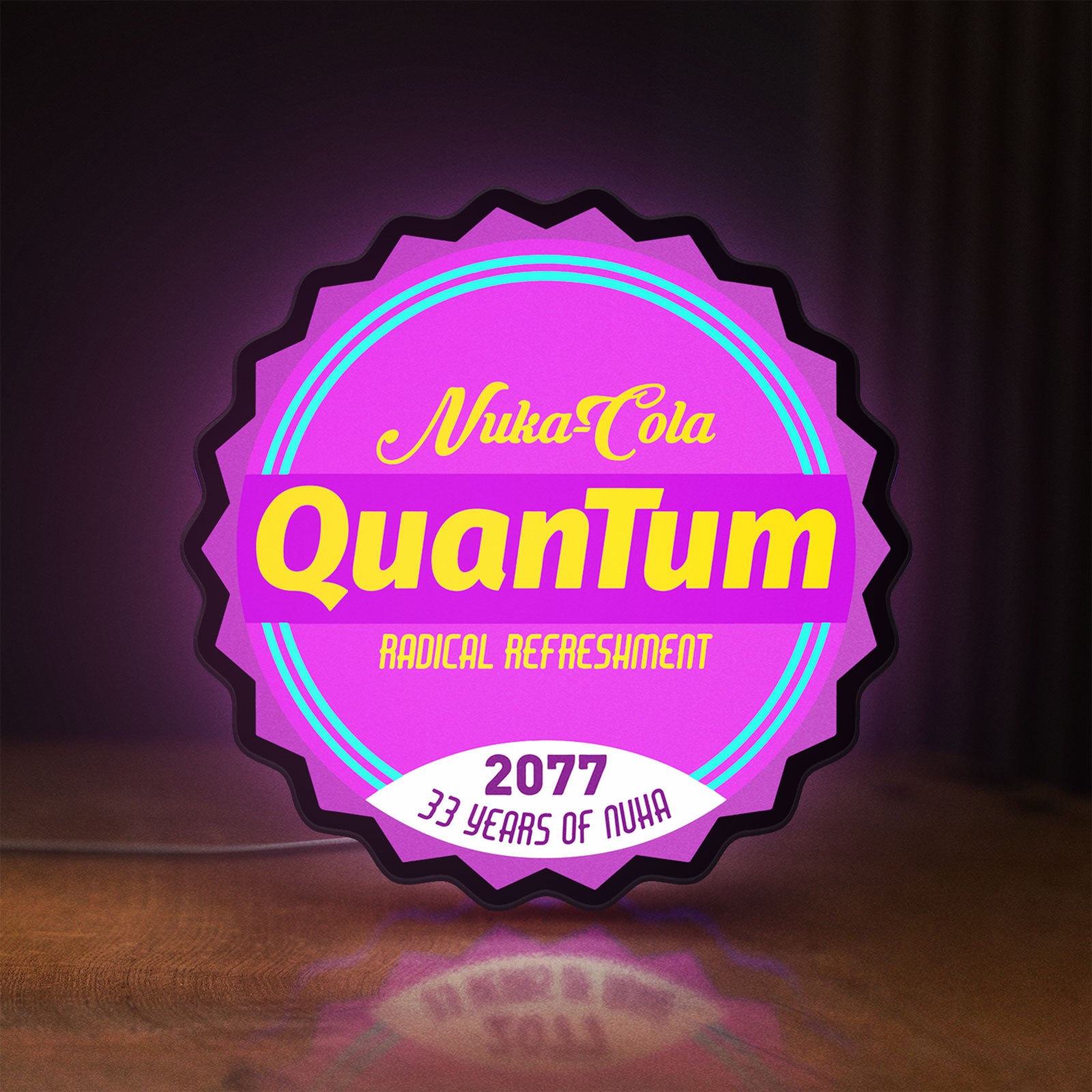 Front view of Fallout Nuka Cola Quantum RPG LED lightbox sign glowing on a wooden desk
