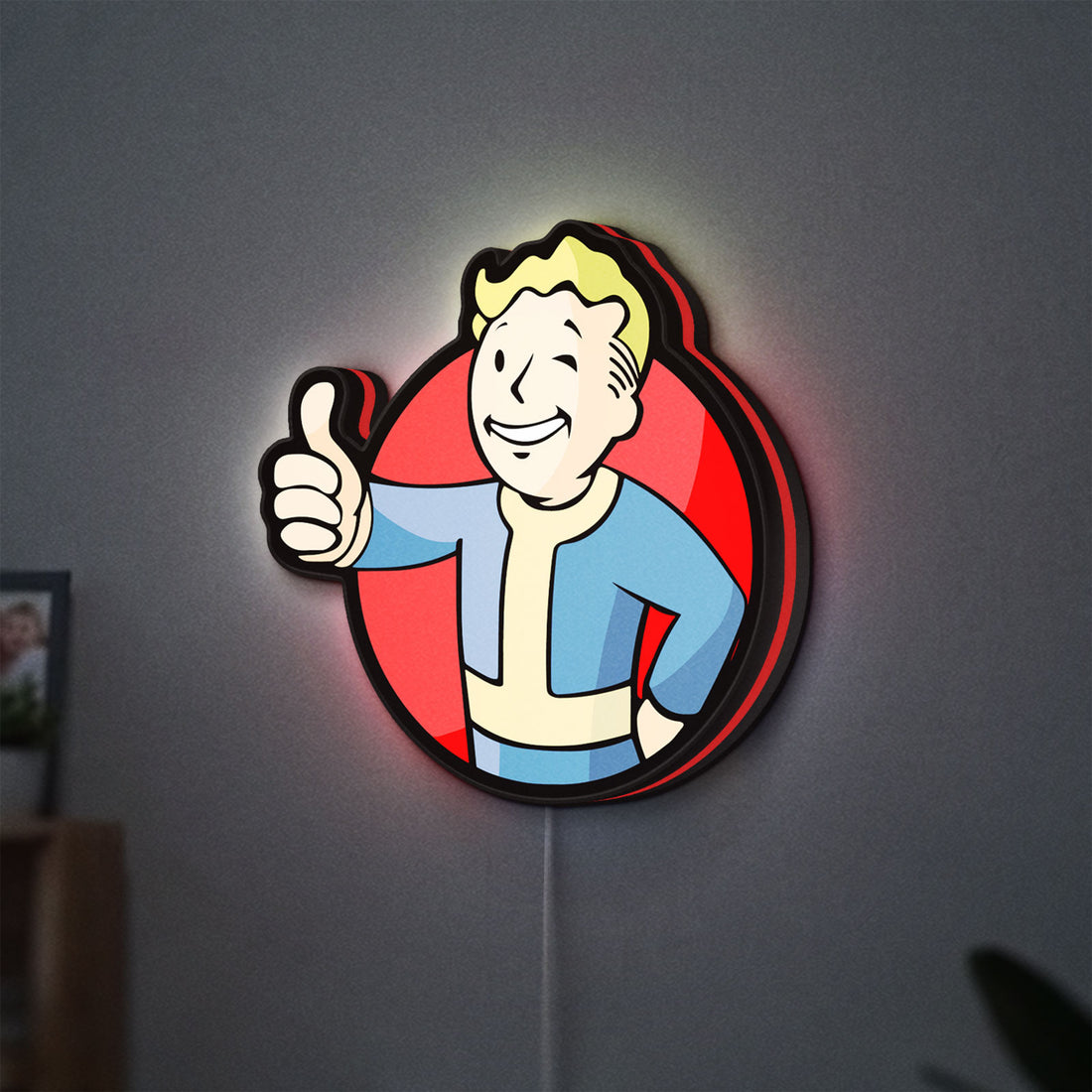 Fallout Vault Boy Thumbs Up Mascot LED lightbox hanging on a wall with red glow