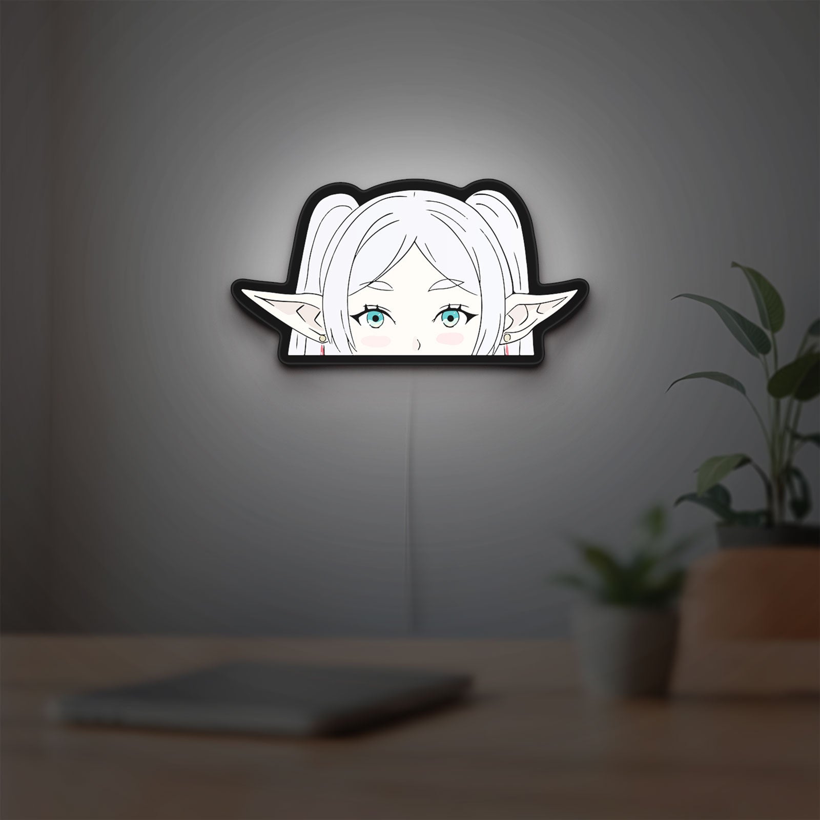 Frieren Beyond Journeys End Elf LED lightbox hanging on a room wall with soft white light