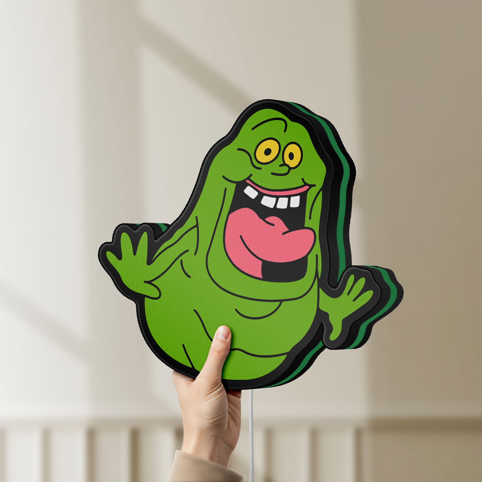 Unlit Ghostbusters Slimer 80s Movie LED lightbox held by hand to show size and details