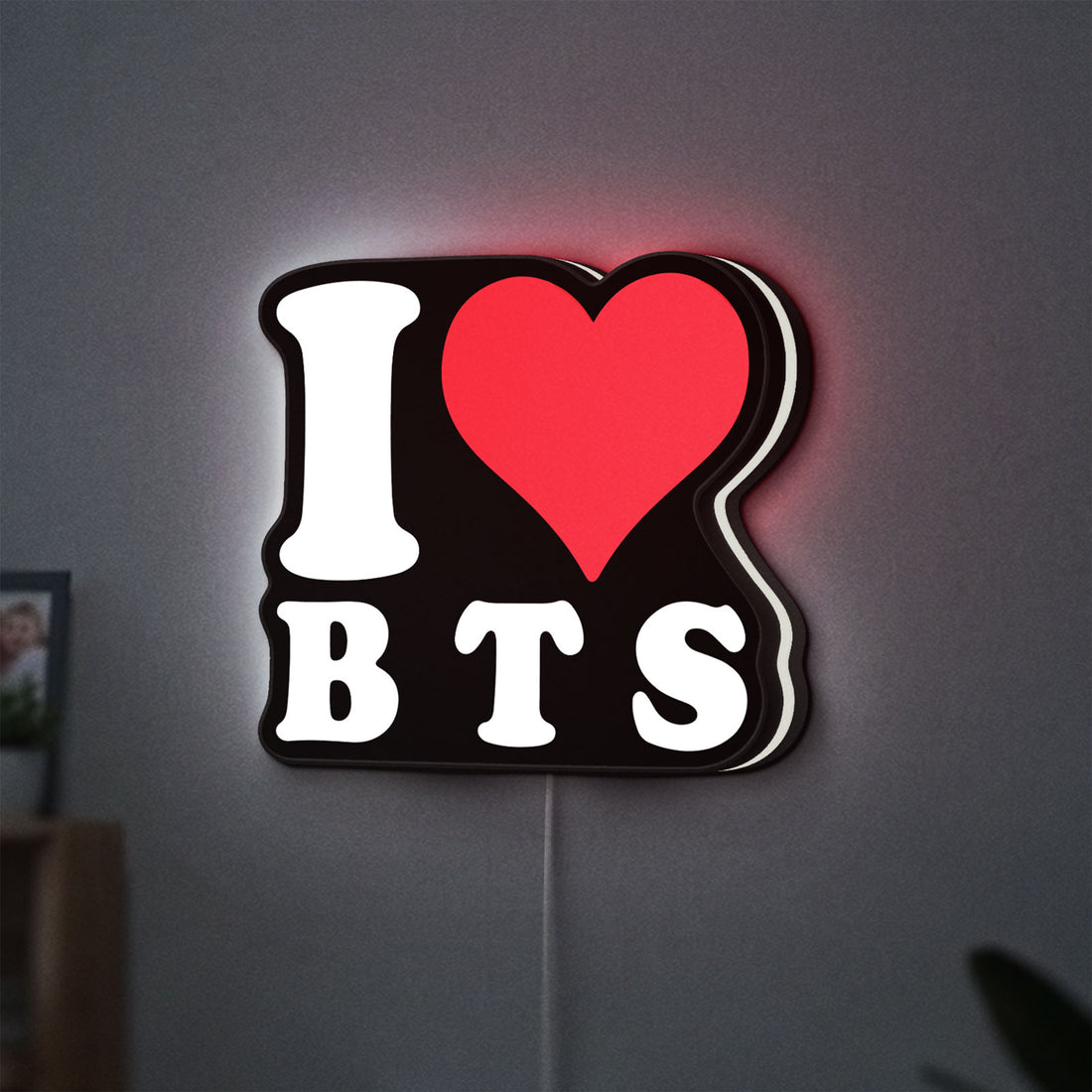 I love BT LED lightbox hanging on a wall with white glow
