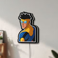 Unlit Invincible Title Logo Superhero LED lightbox mounted on a wall in daylight