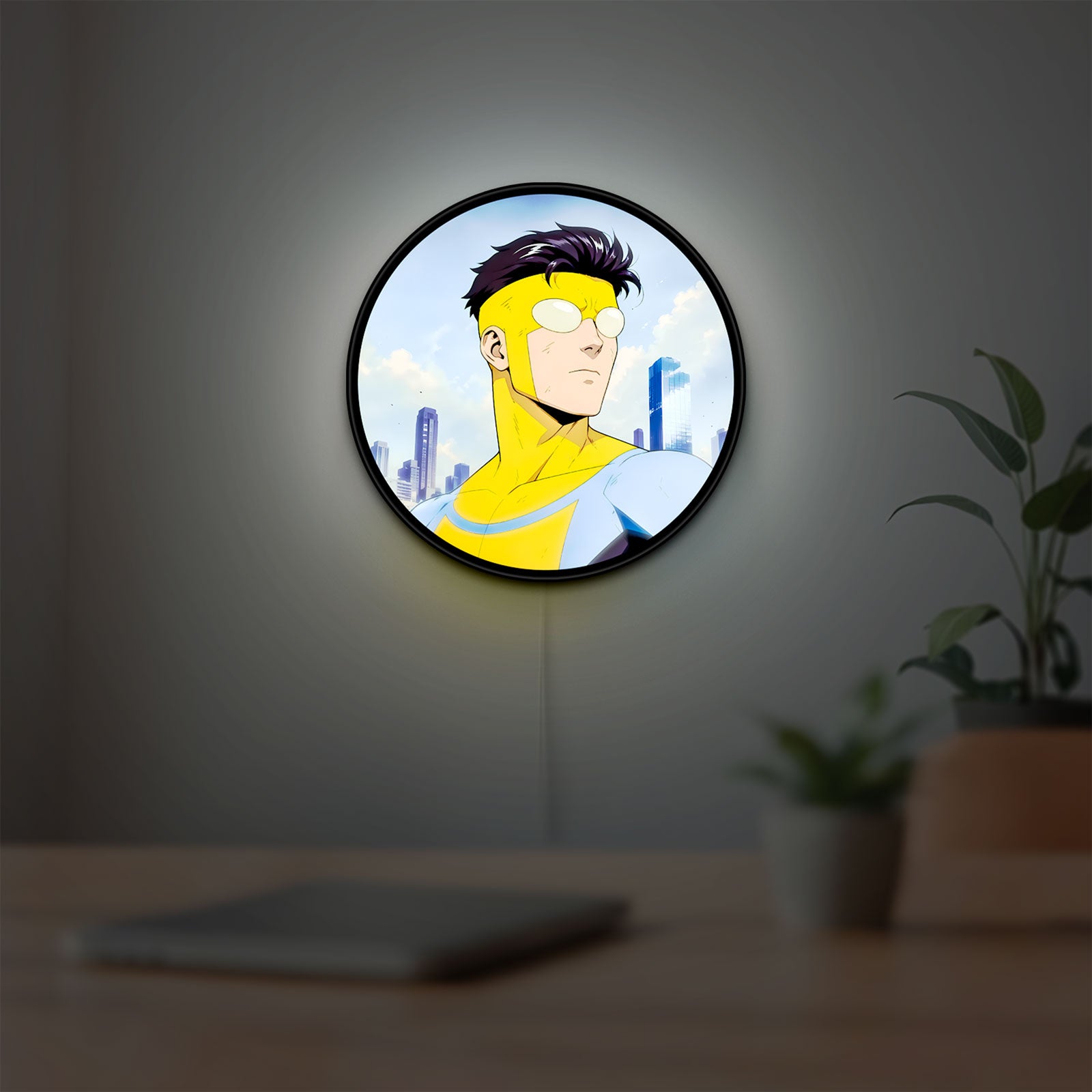 Invincible Title Logo Superhero LED lightbox hanging on a room wall with soft white light