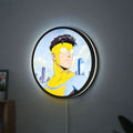 Invincible Title Logo Superhero LED lightbox hanging on a wall with white glow