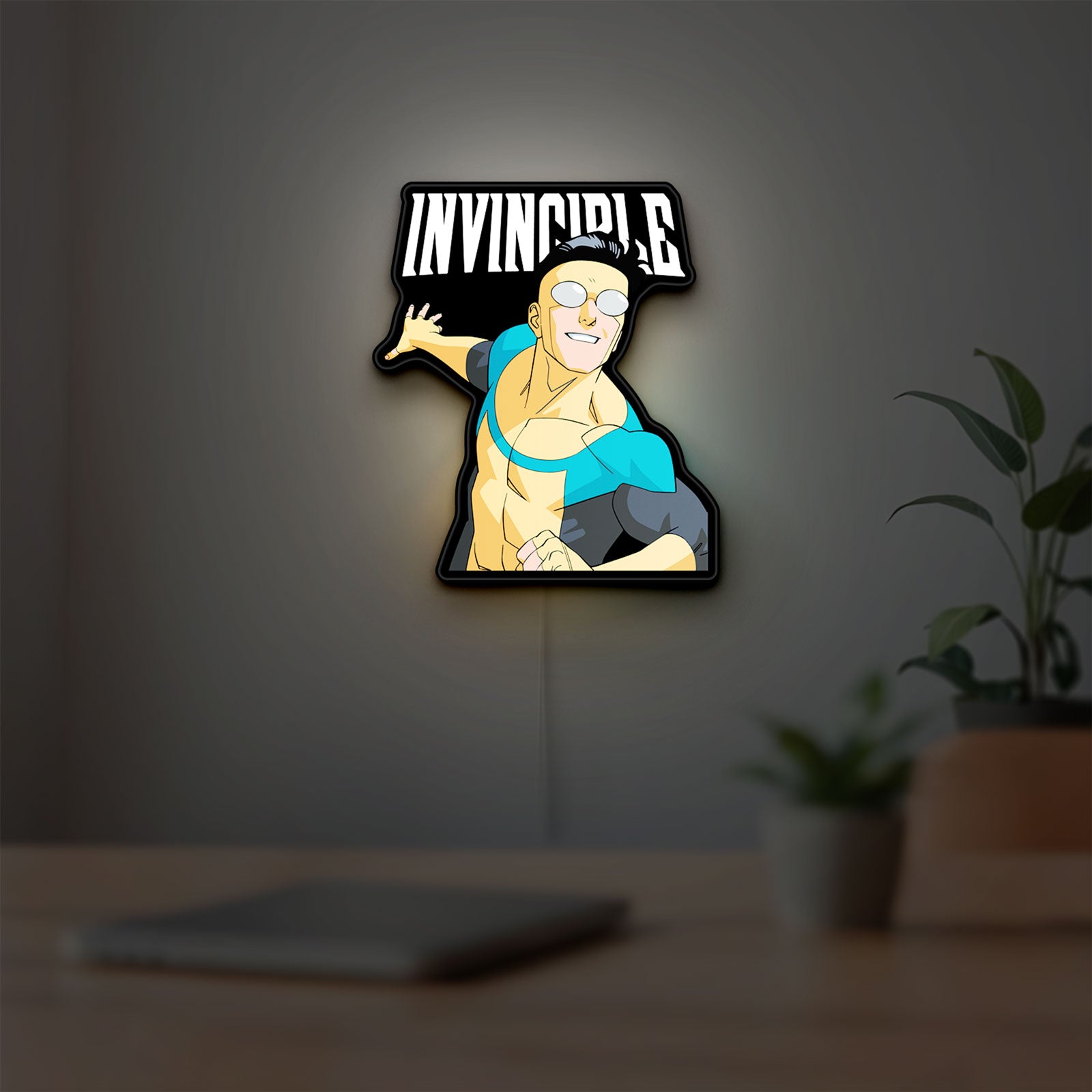 Invincible Think Mark Think Meme LED lightbox hanging on a room wall with soft yellow light