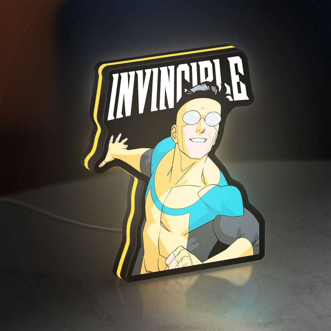 Invincible Think Mark Think Meme LED lightbox hanging on a wall with yellow glow