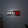 Invincible V Logo Mark Grayson LED lightbox hanging on a wall with white glow