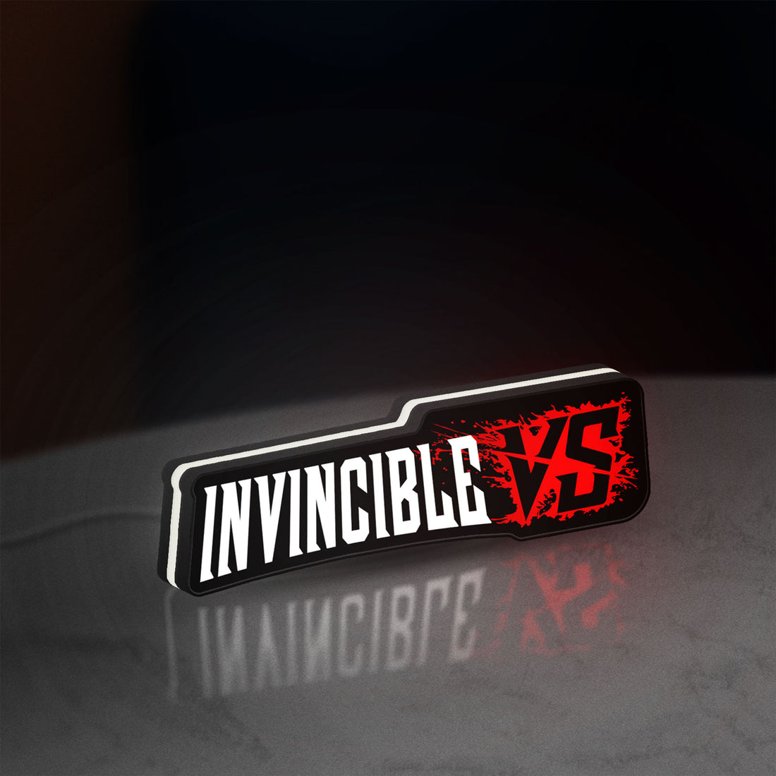 Invincible V Logo Mark Grayson LED lightbox hanging on a wall with white glow