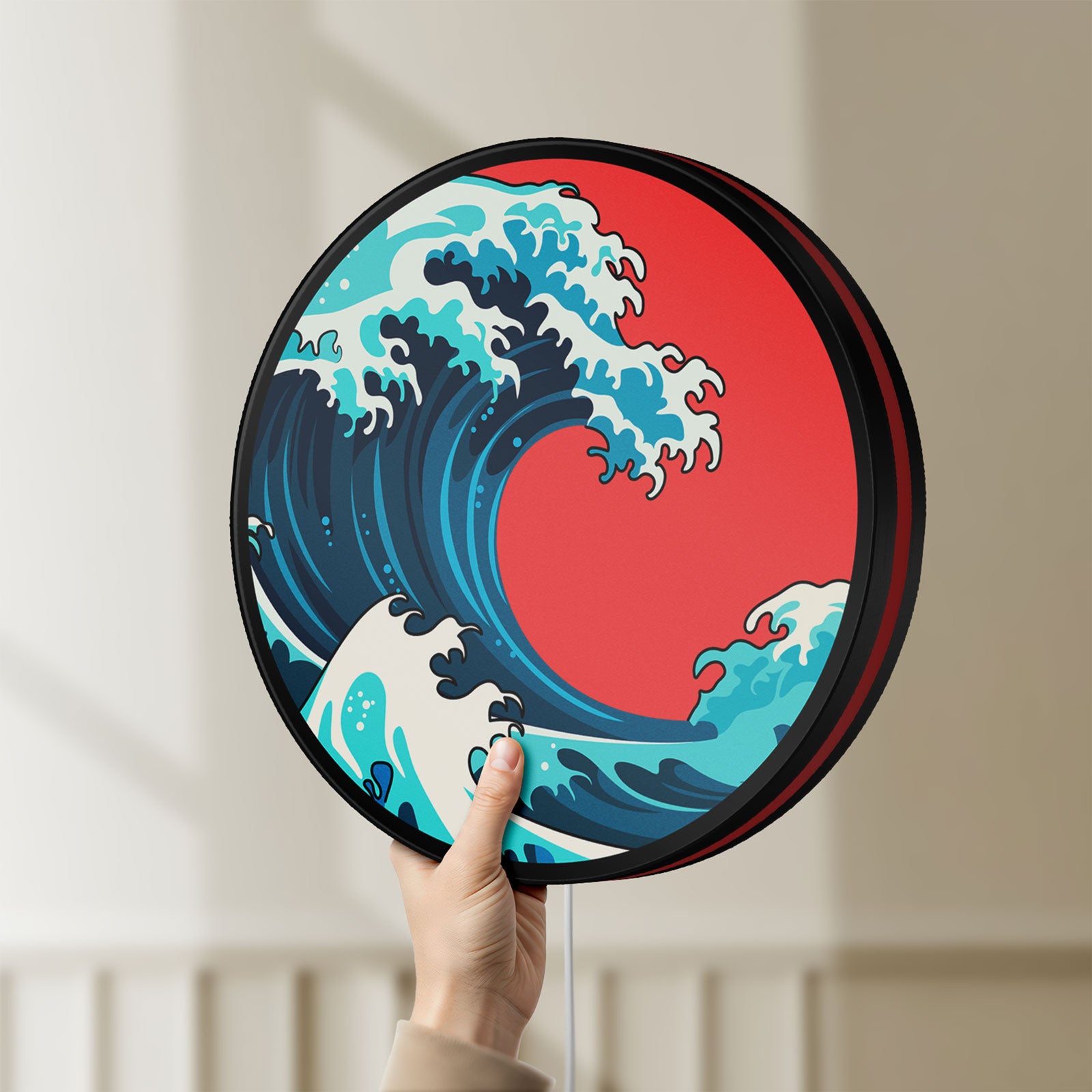 Unlit Great Wave off Kanagawa Ocean Art LED lightbox held by hand to show size and details