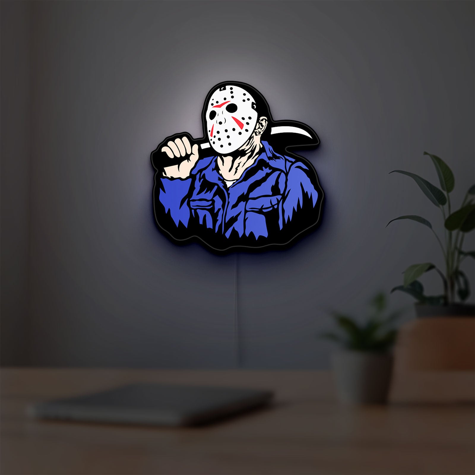 Friday the 13th Jason Mask Slasher LED lightbox hanging on a room wall with soft white light