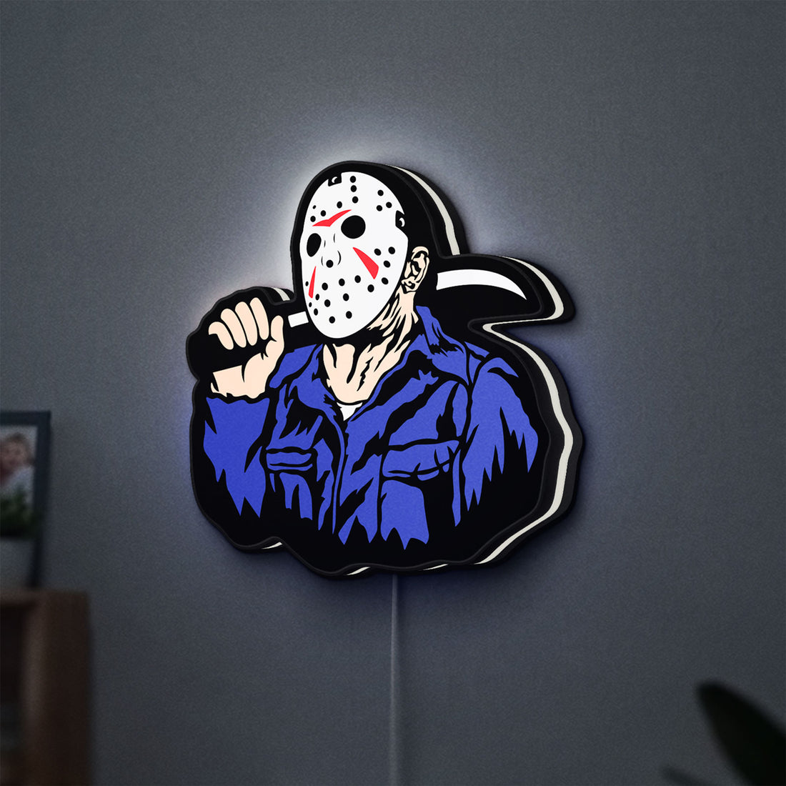 Friday the 13th Jason Mask Slasher LED lightbox hanging on a wall with white glow