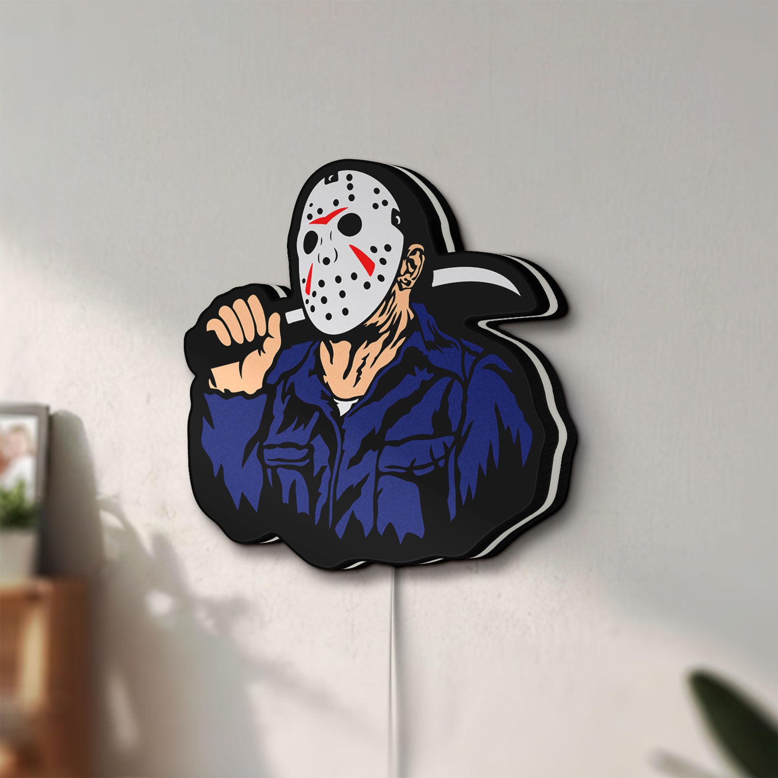 Unlit Friday the 13th Jason Mask Slasher LED lightbox mounted on a wall in daylight