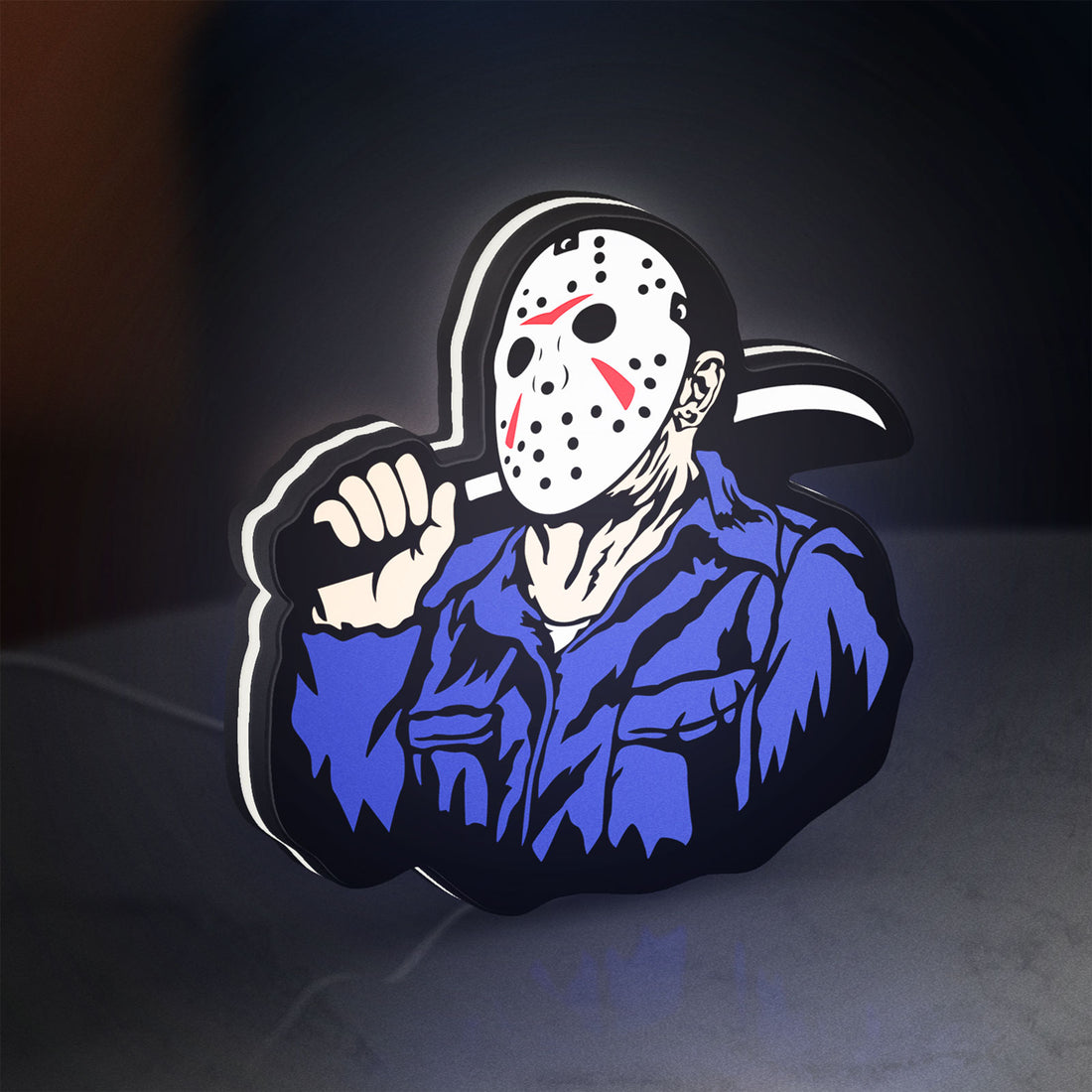 Friday the 13th Jason Mask Slasher LED lightbox hanging on a wall with white glow