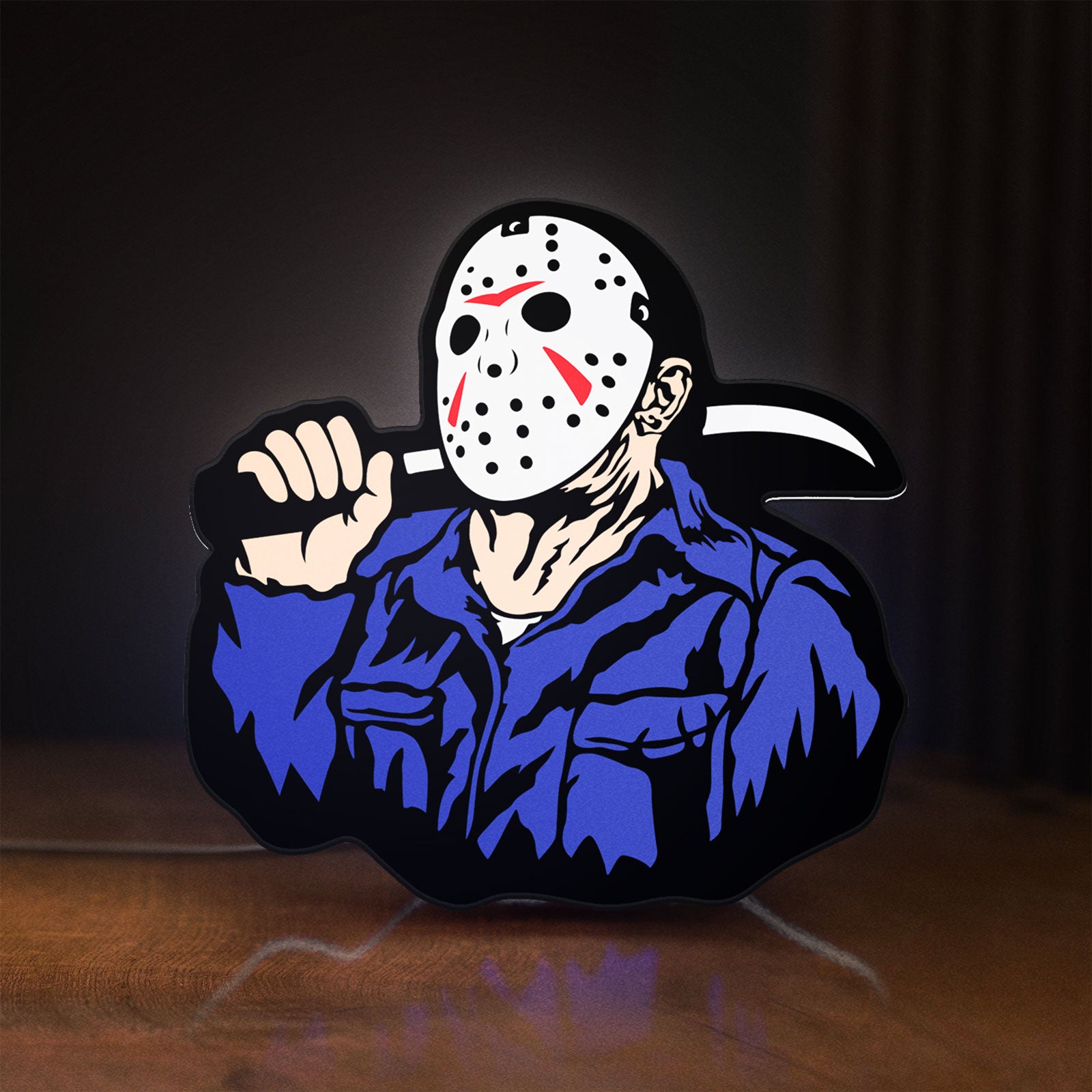 Front view of Friday the 13th Jason Mask Slasher LED lightbox sign glowing on a wooden desk