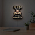 Cute Jumping Spider Arachnid Pet LED lightbox hanging on a room wall with soft white light