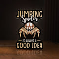 Front view of Cute Jumping Spider Arachnid Pet LED lightbox sign glowing on a wooden desk
