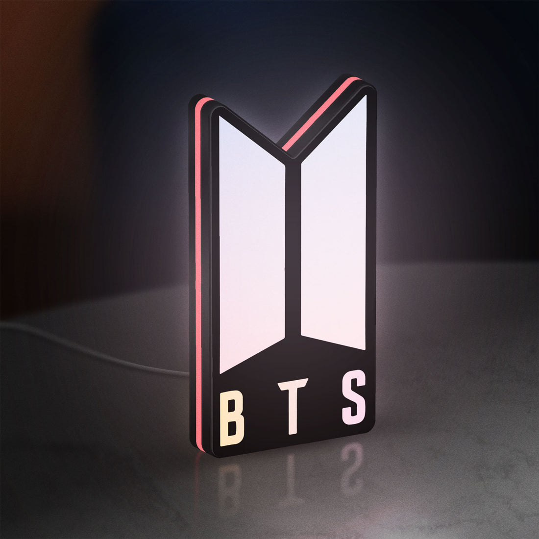 BTS ARMY Logo K-Pop Idol Music Fan LED lightbox hanging on a wall with pink glow