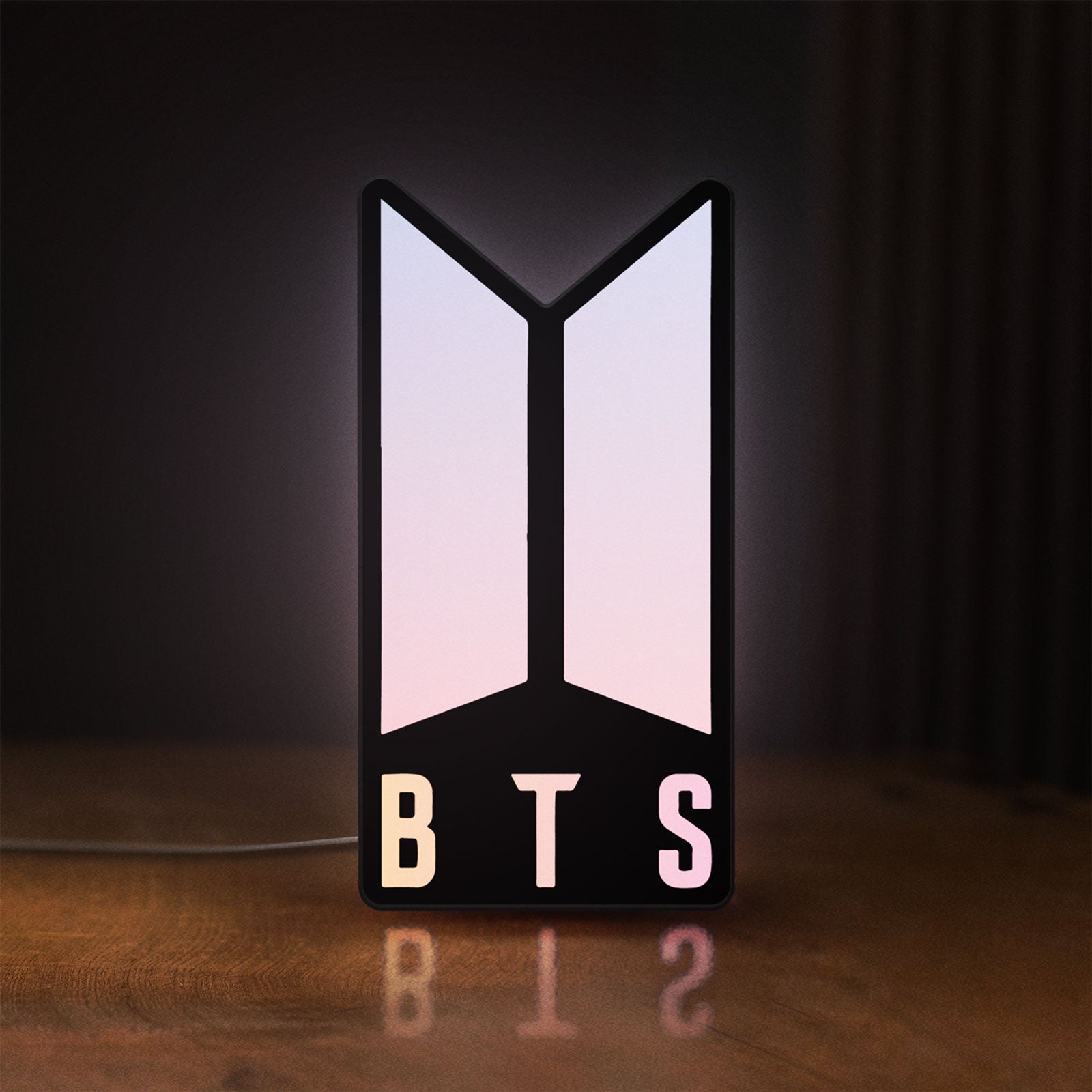 Front view of BTS ARMY Logo K-Pop Idol Music Fan LED lightbox sign glowing on a wooden desk
