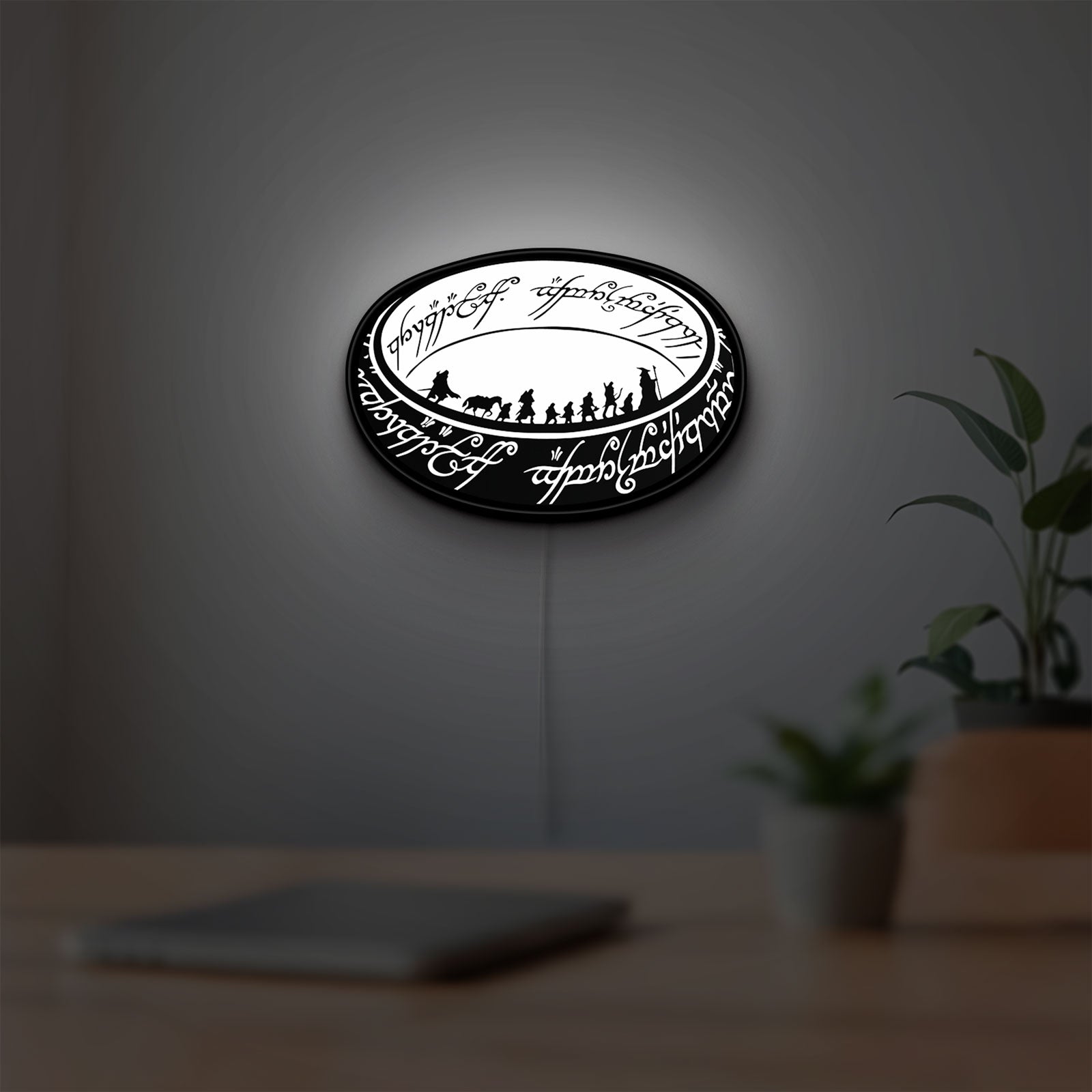 Lord of the Rings One Ring Fantasy LED lightbox hanging on a room wall with soft white light