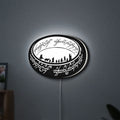 Lord of the Rings One Ring Fantasy LED lightbox hanging on a wall with white glow