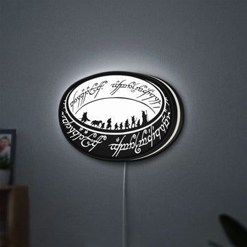 Lord of the Rings One Ring Fantasy LED lightbox hanging on a wall with white glow