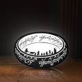Front view of Lord of the Rings One Ring Fantasy LED lightbox sign glowing on a wooden desk