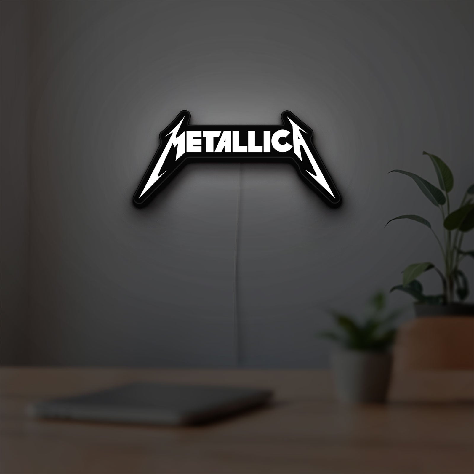 Metallica Band Logo Heavy Metal LED lightbox hanging on a room wall with soft white light