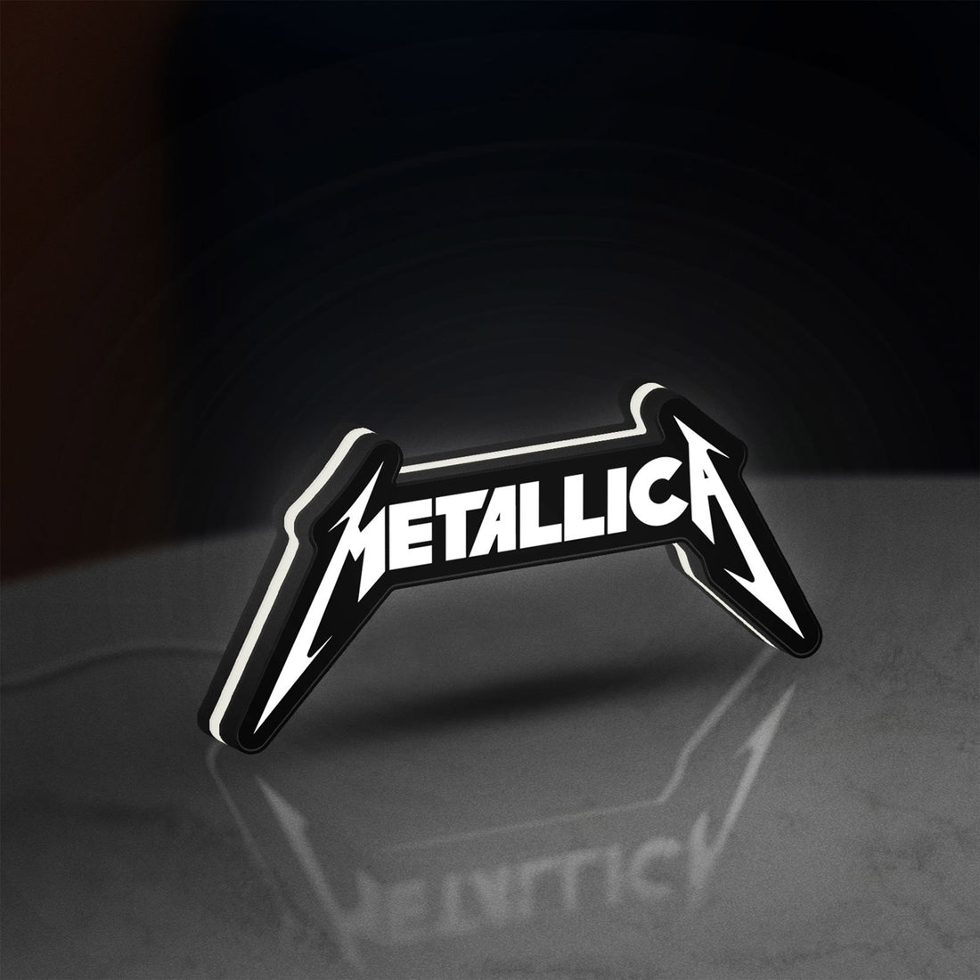Metallica Band Logo Heavy Metal LED lightbox hanging on a wall with white glow