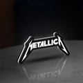 Metallica Band Logo Heavy Metal LED lightbox standing on a desk from an angled side view with white glow