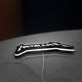 Metallica Band Logo Heavy Metal LED lightbox lying flat on a desk with white glow