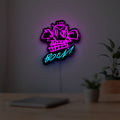 Arcane Jinx Monkey Graffiti LoL LED lightbox hanging on a room wall with soft pink light