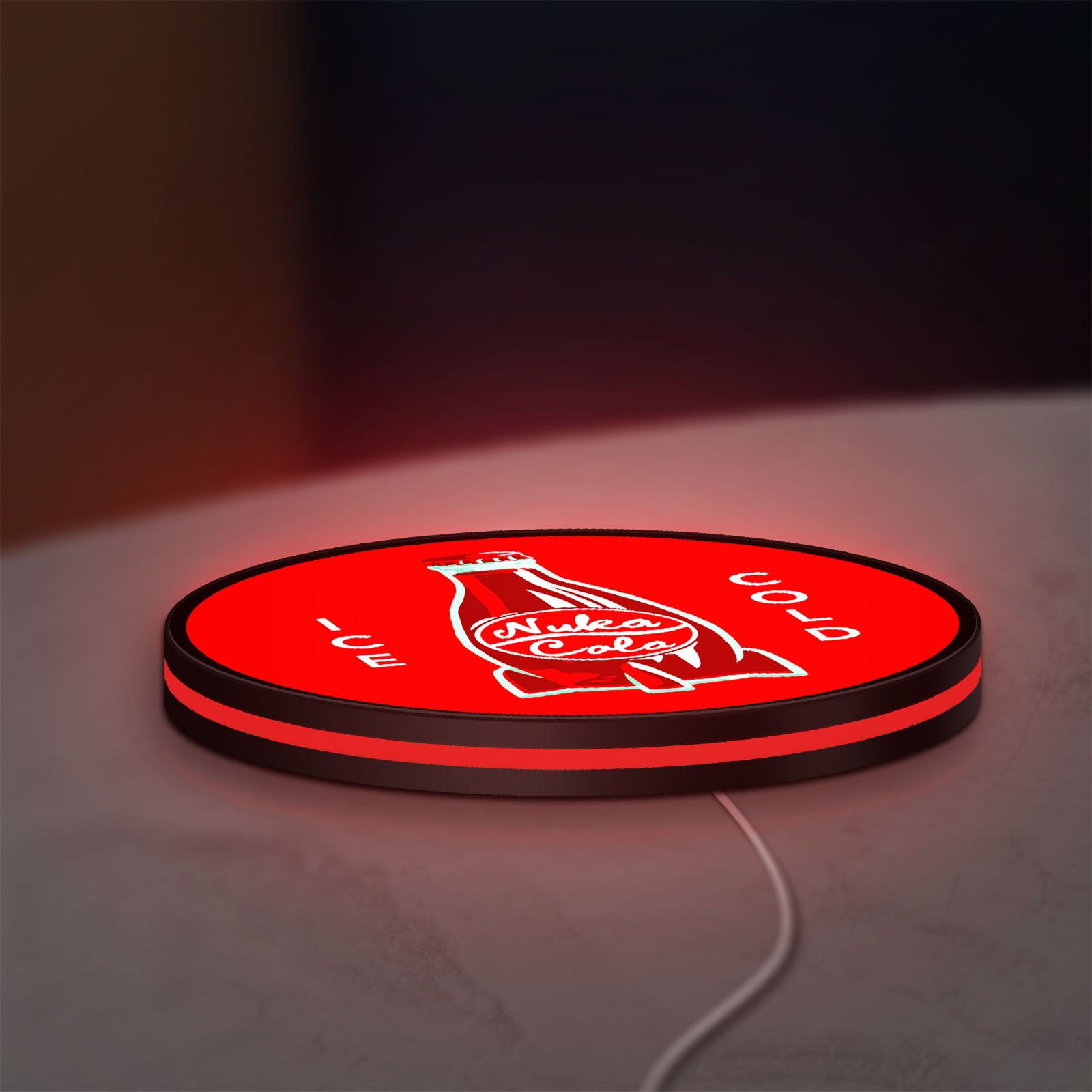 Fallout Nuka Cola Ice Cold Diner LED lightbox lying flat on a desk with red glow